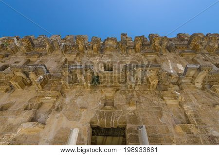 The fragment of a Roman ancient theater in Aspendos. The province of Antalya. Mediterranean coast of Turkey.