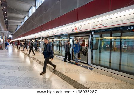 HONG KONG - CIRCA JANUARY, 2016: inside MTR station in Hong Kong. MTR is the rapid transit railway system in Hong Kong. It is one of the most profitable systems in the world