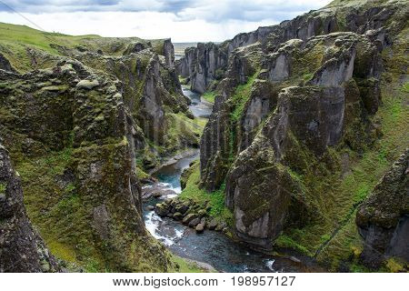 The great green Fjadrargljufur canyon in Iceland.