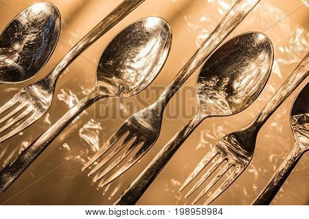 Fork and spoon  with reflections and light effects