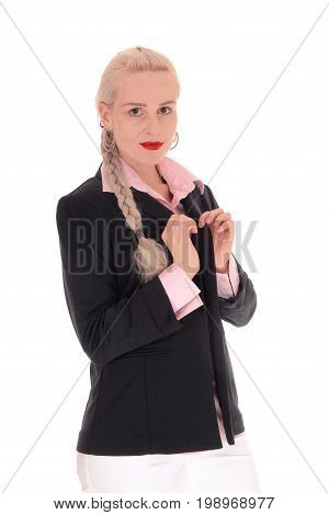 A gorgeous young business woman in a black jacket and pink blouse standing with her blond hair in a braid isolated for white background