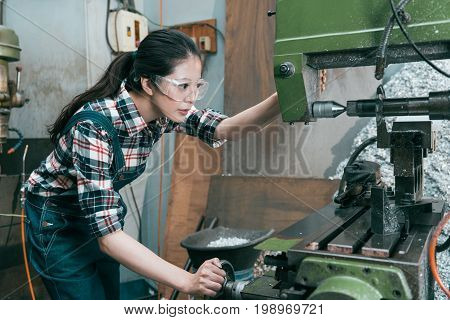 Young Lathe Company Woman Worker Wearing Goggles