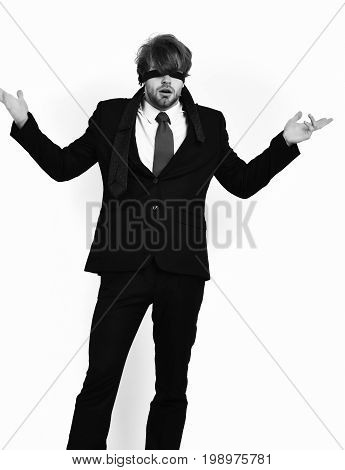 Bearded man short beard. Caucasian stylish surprised macho with moustache in elegant suit red tie white shirt with blindfold eyes posing at studio isolated on white background