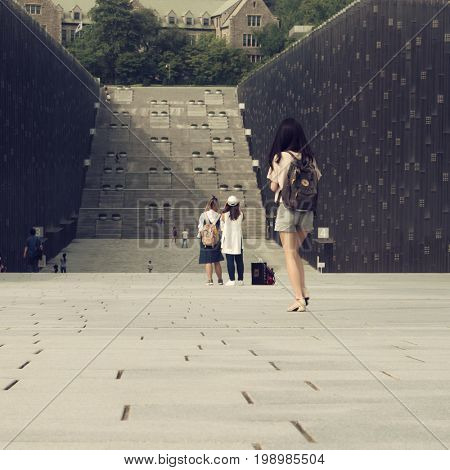 Seoul - July 2017: Student walking in campus complex at Ewha Womans University.
