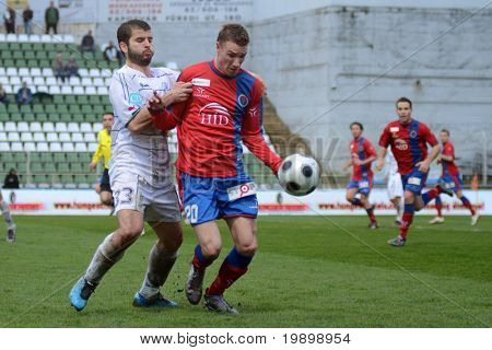 KAPOSVAR ฮังการี - 1 เมษายน: Gergo Beliczky (20) ในการดำเนินการที่ socc การแข่งขันชิงแชมป์แห่งชาติฮังการี