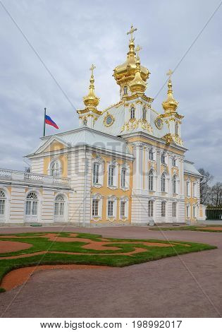 SAINT PETERSBURG RUSSIA - MAY 23 2017: Scenic view of the Grand Cascade The Peterhof Palace and Gardens complex is recognized as a UNESCO World Heritage Site