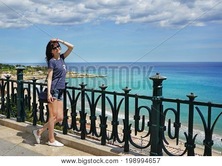 Beautiful Girl On  Holidays In A Spain, Balcony Of Mediterranean, Tarragona, Costa Daurada, Cataloni