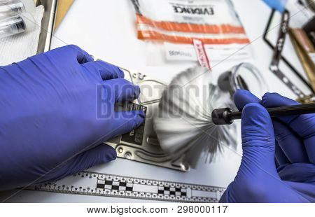 Police Scientific Analyzes Cover Of Hard Drive To Find Traces In The Laboratory Scientific, Conceptu