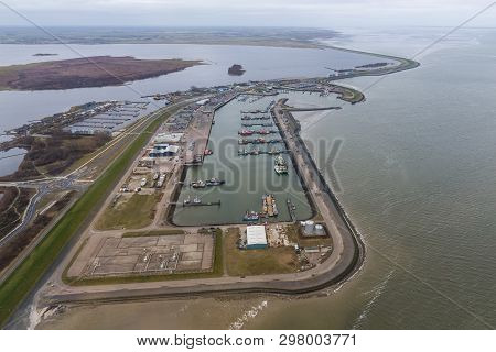 Aerial View Harbor And Industrial Park Lauwersoog At Dutch Coast Of Wadden Sea