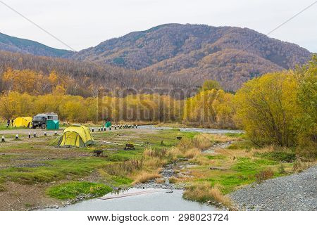 Malkinskiye Hot Springs, Malka, Russia- 27 September 2014: People In A Hot Springs In The Center Kam