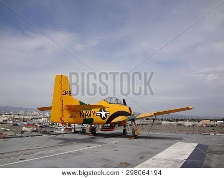 Alameda, Ca - April 21 2011: T-28b Trojan On The Deck Of The Legendary Wwii Uss Hornet Aircraft Carr