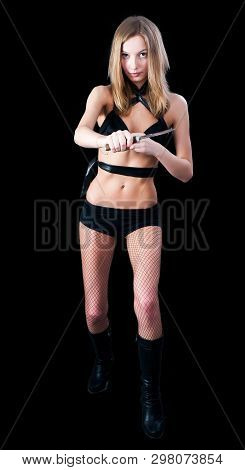 Young Beautiful Woman With Steek Knife. Isolated On Black