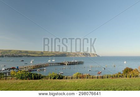 The Seafront At Swanage On The Dorset Coast Looking Across The Bay From Peveril Point