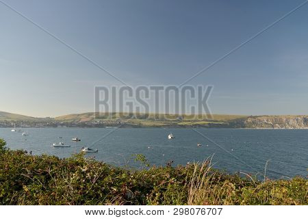 The Seafront At Swanage On The Dorset Coast Looking Across The Bay From Peveril Point