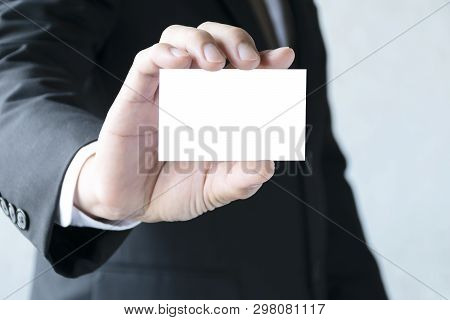 Copy Space Concept.businessman Holding A White Business Card.wearing A White Tie Shirt,wearing A Bla