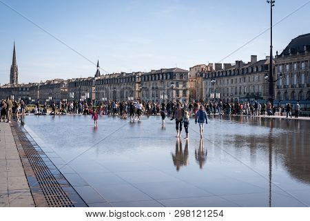 Bordeaux, France - April 14, 2019: The Water Mirror Of The Bordeaux Quays On A Sunny Spring Day