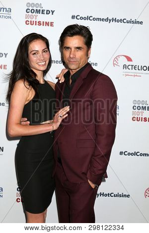 LOS ANGELES - APR 25:  Caitlin McHugh, John Stamos at the Cool Comedy, Hot Cuisine 2019 at the Beverly Wilshire Hotel on April 25, 2019 in Beverly Hills, CA