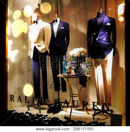 Paris, France - 12 January 2019 Mannequin In Business Suit, Standing Dummy In Shop Window With Bow T