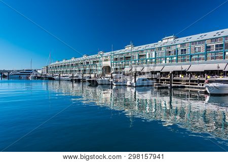 Picturesque Woolloomooloo Wharf With White Yachts And Boats On Sunny Day