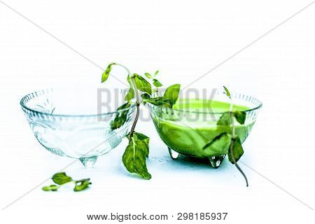 Best Home Remedy Or Treatment To Reduce Rashes Isolated On White Consisting Of Mint And Water In A G