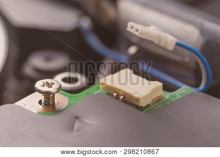 Metal Bolt Fastening. Computer Connector And Cable On The Processor