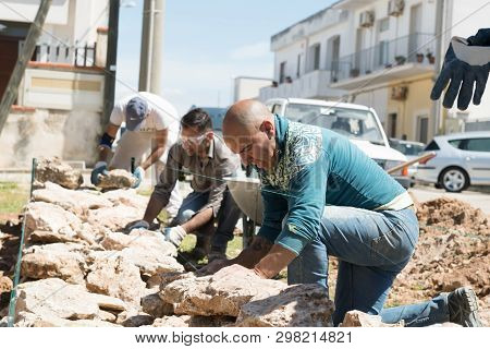 Maruggio, Italy - April 28, 2019 - Construction Of A Low Wall - Old Traditional Apulian Architectura