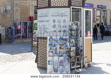 Bukhara, Uzbekistan - March 13, 2019: Kiosk Selling Greeting Cards With Photos And Views Of Bukhara,