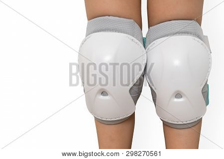 Pair Of Knee Pads Wearing On Legs Of Child