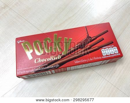 Bangkok Thailand - 29 April 2019: Glico Pocky Biscuit Sticks Box On The Wood Table