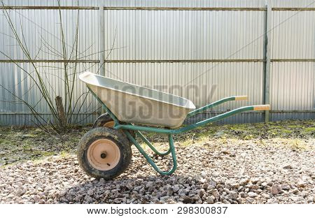 Iron Construction Wheelbarrow. Repair Work On The Site