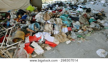 Broken Dirty Objects After The Eviction Of Homeless Shelter With Tatters