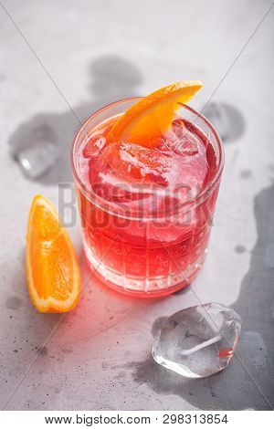 Fresh Ice Tea Carcade Summer Cocktail With Orange And Ice