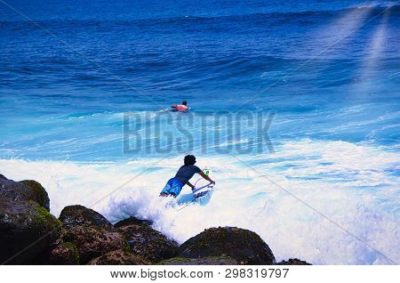Hossegor, France - February Circa , 2019. An Unidentified Surfer Man Is Waiting For A Good Wave To S