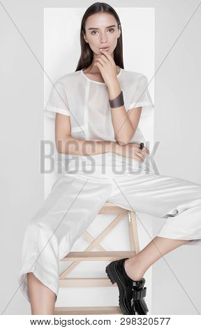 Sensual Brunette In White Apparel
