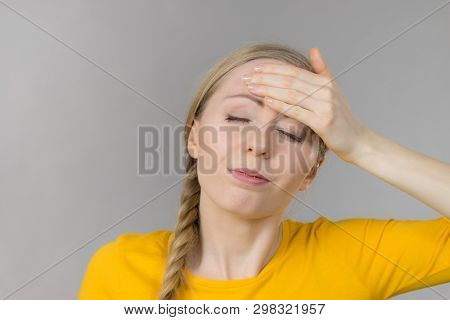 Young Blonde Woman Having Serious Migrene Suffering From Horrible Head Ache Feeling Big Pain.