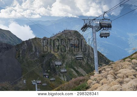 Sochi, Russia-september 30, 2017: Mountain Landscape With Rocky Slopes And The Cable Car In Krasnaya