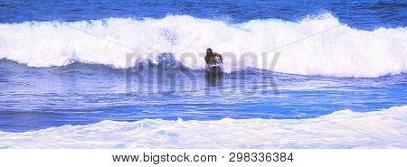 Hossegor, France - February Circa , 2019. An Unidentified Surfer Man Catching Riding On An Ocean Wav