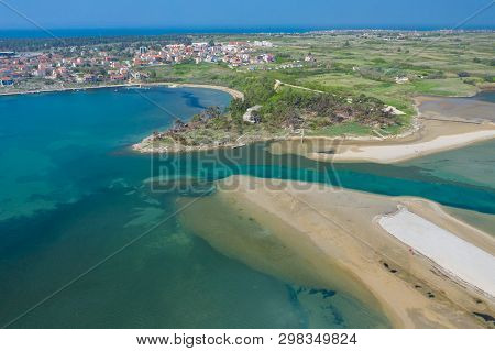 Aerial View Of City Of Nin. Summer Time In Dalmatia Region Of Croatia. Coastline And Turquoise Water