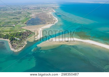 Aerial View Of City Of Nin. Summer Time In Dalmatia Region Of Croatia. Coastline And Turquoise Water