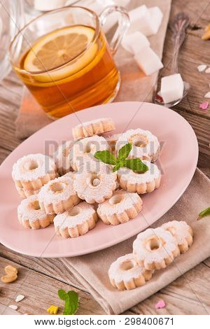 Canestrelli Biscuits With Mint On Wooden Table.