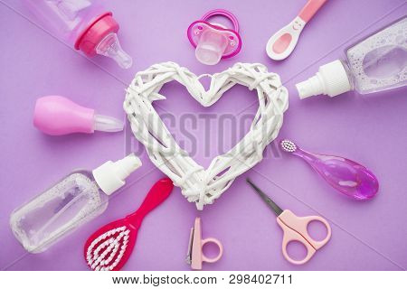 Newborn Baby Story. Strow Heart And Childrens Toys, Scissors, Baby Bottle, Nipple, Hairbrush On Viol