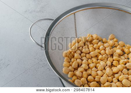 Organic Seeds In Sieve. Dry Chickpeas For Healthy Eating. Overhead View. Nutrient Dense Food. Garban