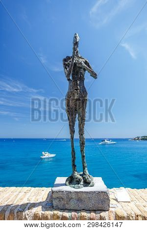 Antibes, France - 15 August, 2017: The Statue La Grain By Germaine Richier Located In The Yard Of Pa