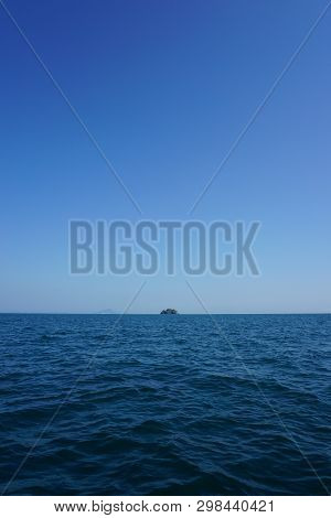 Thailand Ocean In Krabi Province On A Spring Day With Single Island In Background.