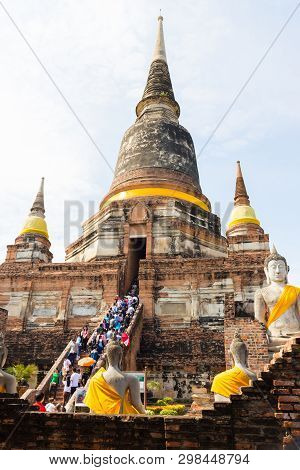 People Visiting The Temple Of Ayutthaya Historical Park On Thailand.