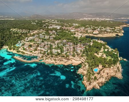 Beautiful birdeye view on the sea coastline with pier and yakhts at sunny day. Travell, jorney,islands, Seascape, freedom, holidays concept.