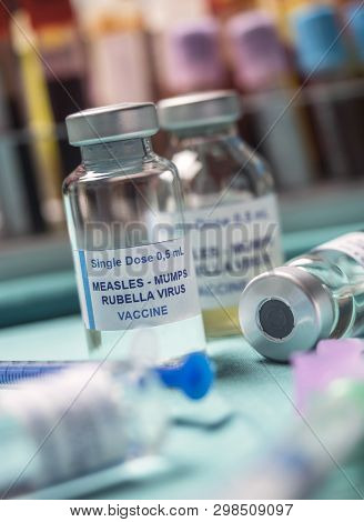 Different Vials Of Triple Viral Vaccine Of Measles, Rubella And Mumps, Known As Mmr, Conceptual Imag