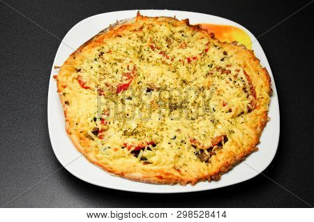 Homemade Classic Pizza With Beef, Cheese, Tomatoes. Top View, Dark Background