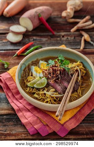 Bowl Of Spicy Mee Rebus With Chopsticks, Malaysian Cuisine