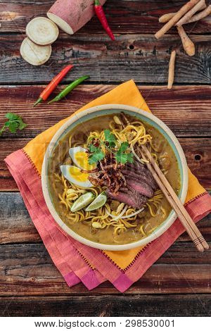 Bowl Of Spicy Mee Rebus With Chopsticks, Malaysian Cuisine